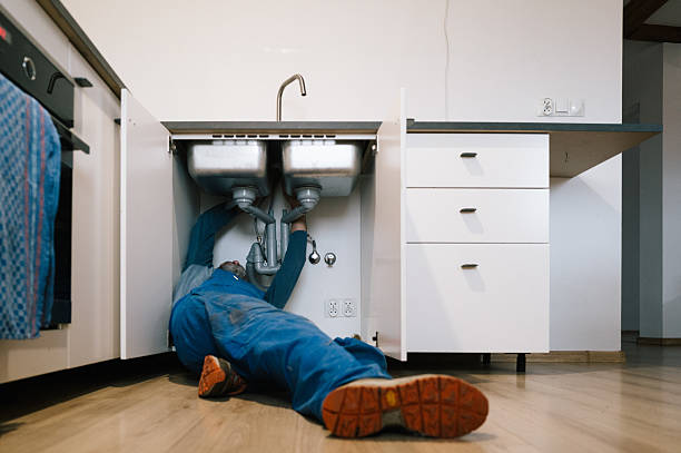 Professional Plumbing technician working in Melbourne, IA
